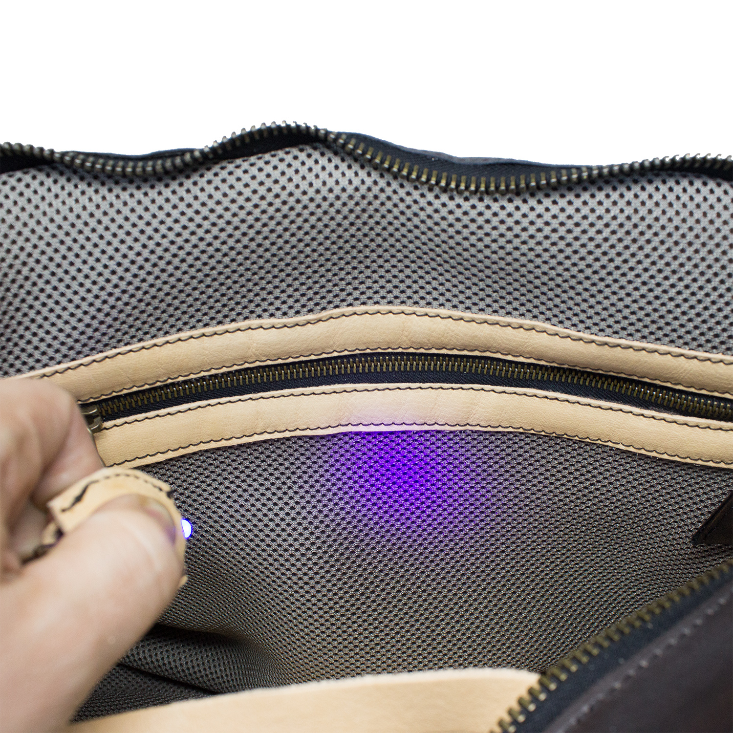 Men's leather shoulder bag for laptop with LED light placed inside the bag facilitates the visualization of the contents.