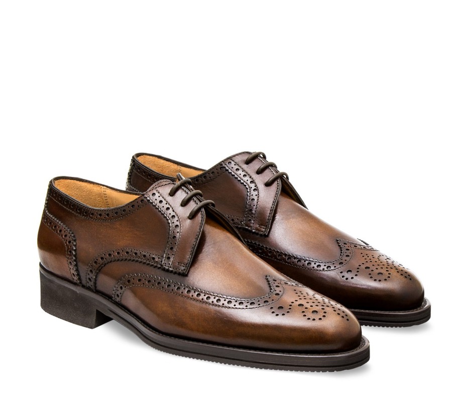 Leather men's shoes, full brogue derby model Made of genuine calf leather aged by Florentine master craftsmen.