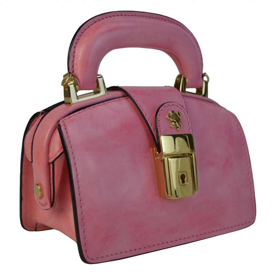 Small woman leather handbag with handle. This bag model combines the highest quality materials, simple design and timeless style.