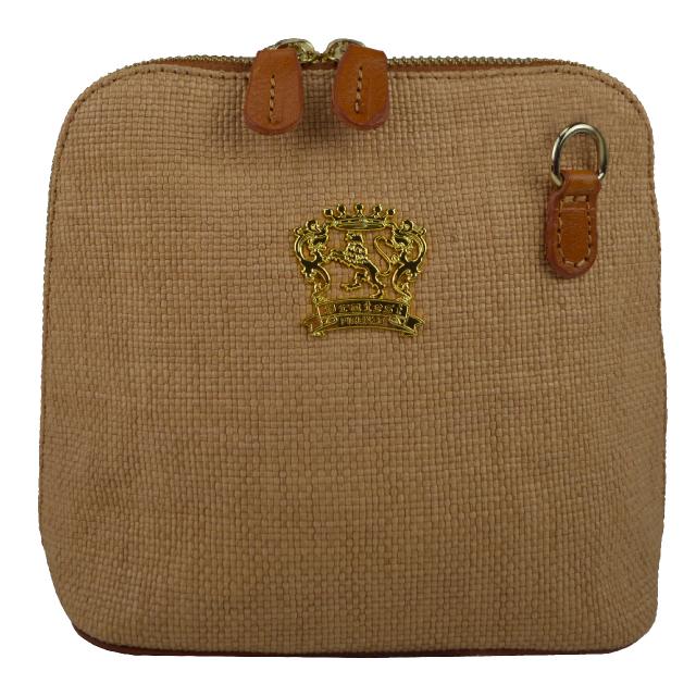 Shoulder bag in leather and natural straw. This small handbag will be perfect for all occasions.