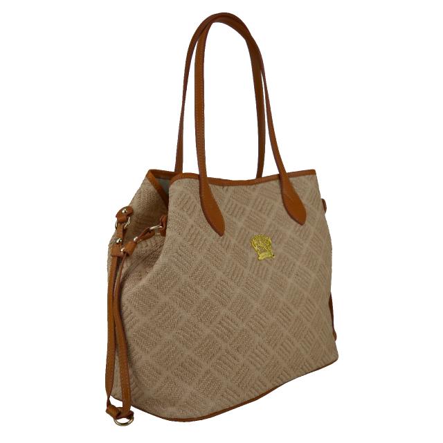 Woman leather handbag . Thanks to this elegant bag, no outfit will seem boring and mundane!