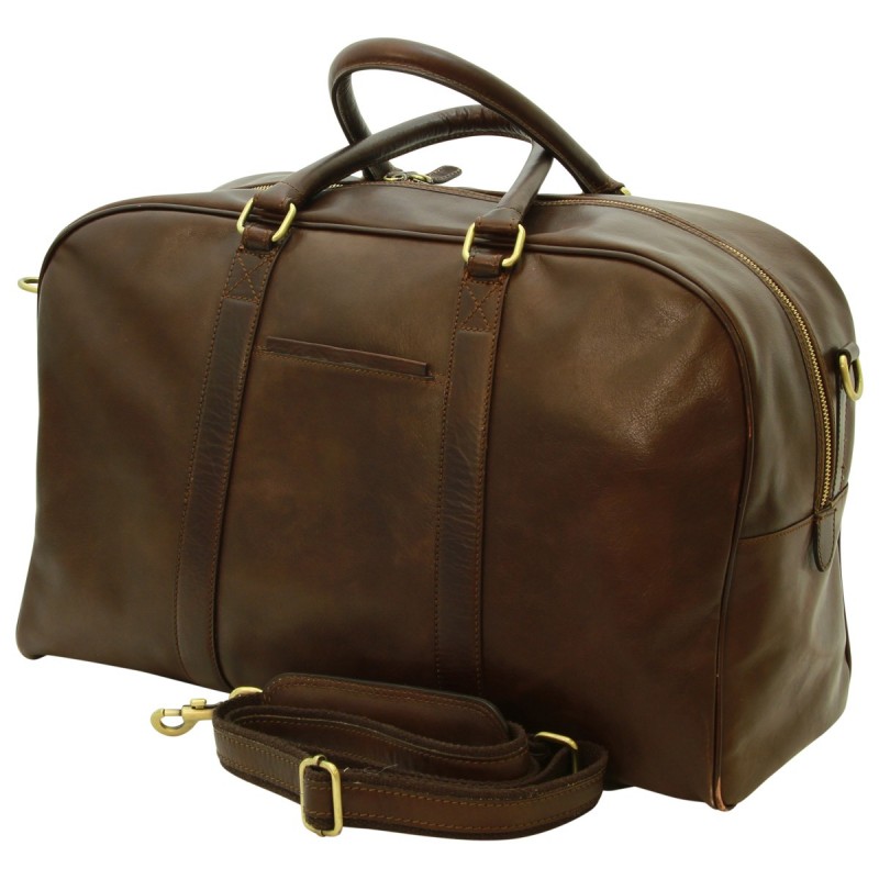 Big, minimalist travel bag in fine calfskin. Cotton lining. A spacious compartment. Internal zip pocket. Front pocket.