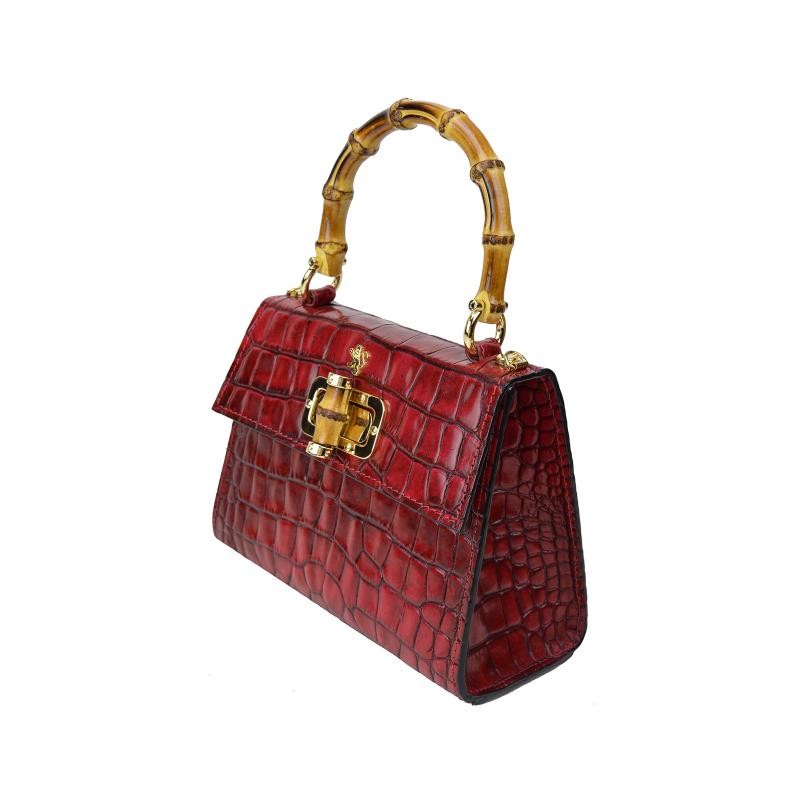 Women leather bag with crocodile print. Thanks to this elegant bag, no outfit will seem boring and mundane!