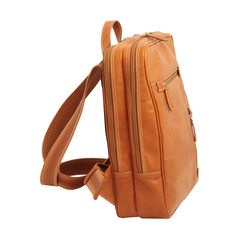 Leather backpack, cognac color adjustable cotton and leather shoulder straps and mesh on the back.