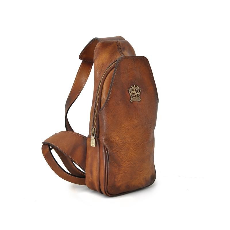 Single-shoulder leather backpack is illuminated by a LED light that can be operated with a button.