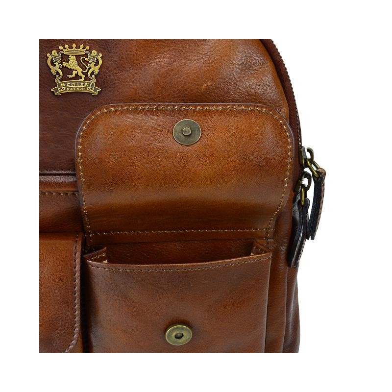 Backpack in vegetable tanned Italian leather, it is illuminated by a LED light that can be operated with a button, including fleece pouch.