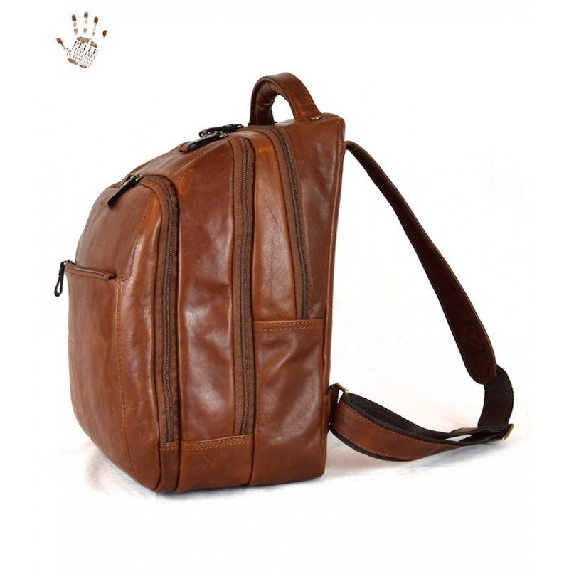 Leather men's backpack single handle, 1 front pocket with zip closure.